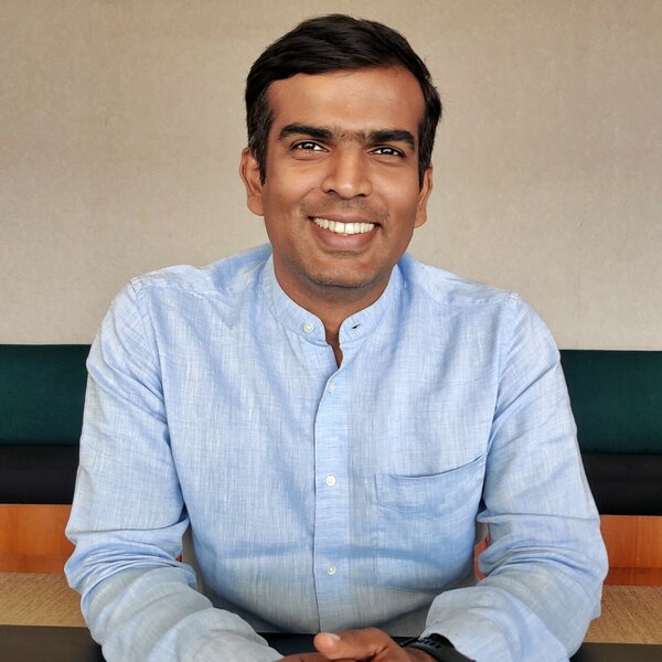 Image showing Raghunandan G, founder and CEO of Zolve, seated at a table